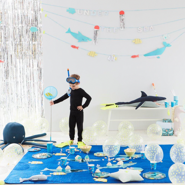 child's room decorated with under the sea themed items
