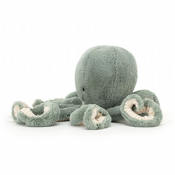 side vie of little mint colored fluffy octopus