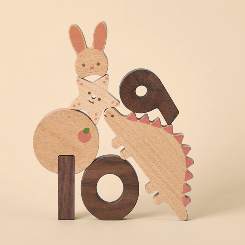 A set of wooden number blocks with animal figures associated with each number, crafted from beech and walnut wood, designed for young children.