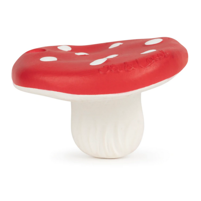 A red and white mushroom-shaped teether made of natural rubber.