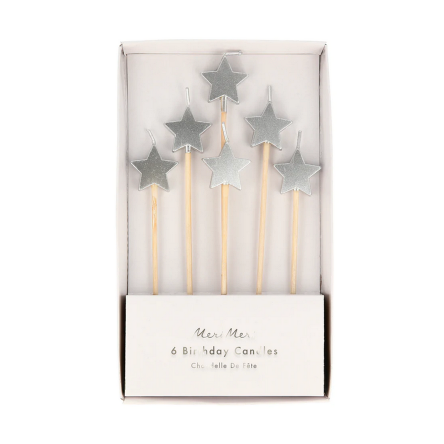 A pack of six silver star-shaped birthday candles with natural wooden sticks, displayed in a white box.