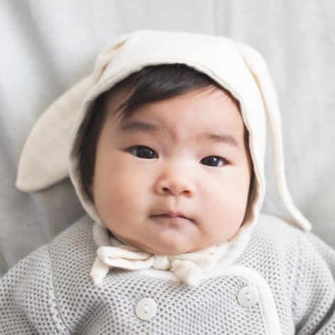 baby wearing bunny bonnet