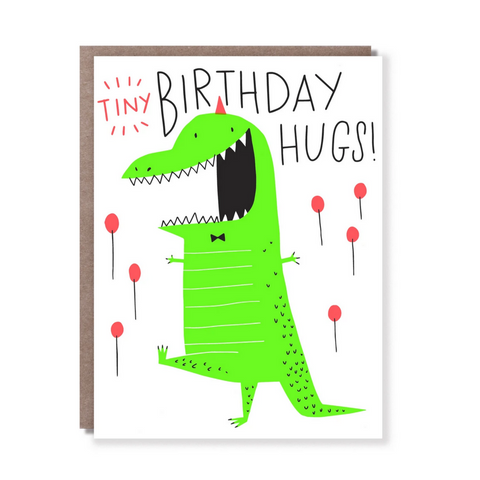 white card with green dinosaur and red balloons with black text