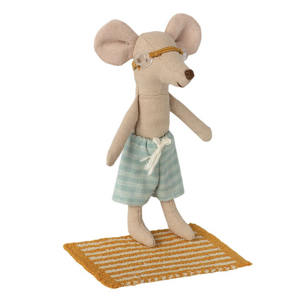 little mouse wearing goggles and standing on yellow striped towel