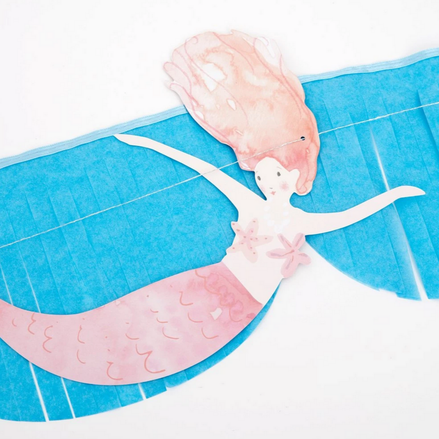 close up of mermaid with pink tail
