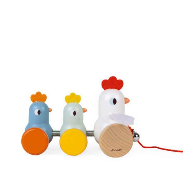 side view of row of colorful wooden chickens on wheels, with bell and string
