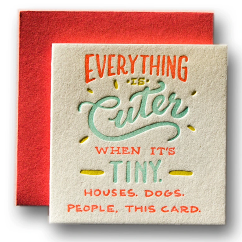 colorful script that reads 'everything is cuter when it's tiny. houses. dogs. people. this card.