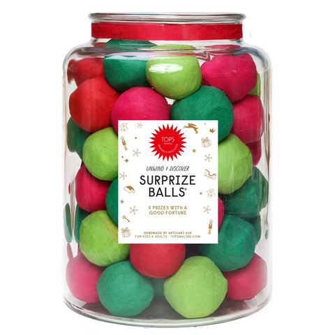 jar filled with pink, red, and two colors of green surprize balls
