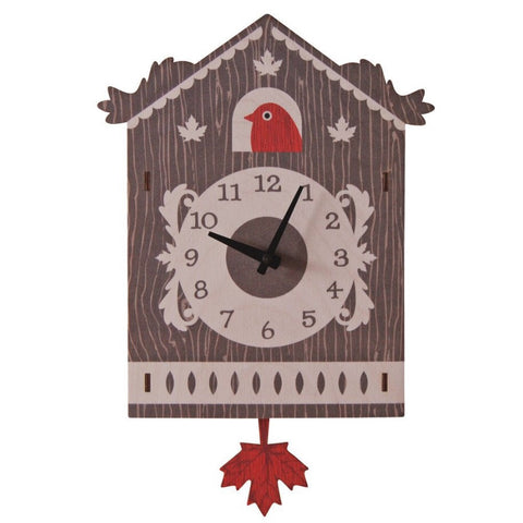 wooden clock featuring wood grain and a red bird with swinging red maple leaf on pendulum