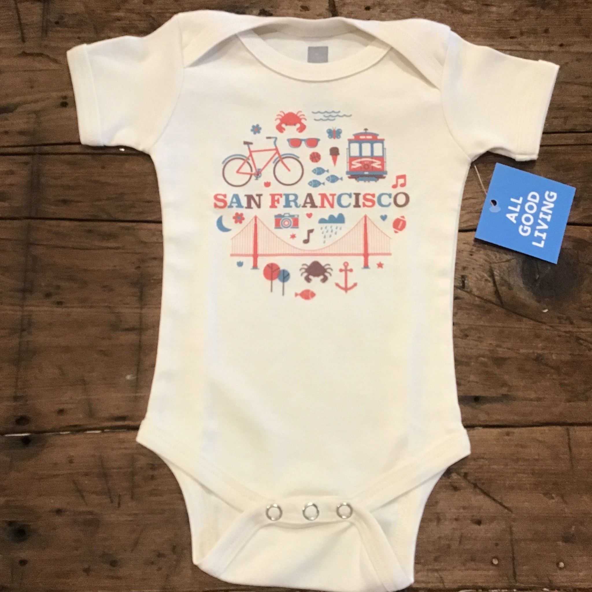 retro iconic san francisco pictures on a cream baby onesie