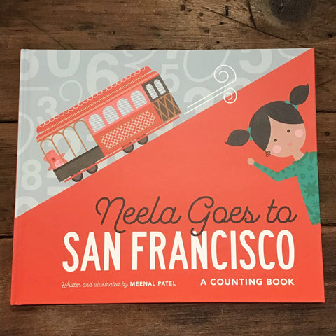 book cover featuring a little girl and a teddy bear riding uphill on a cable car
