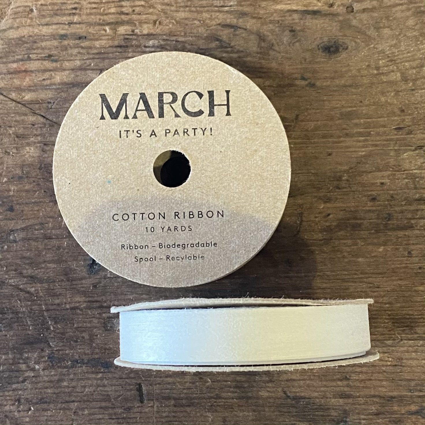 cream ribbon in packaging