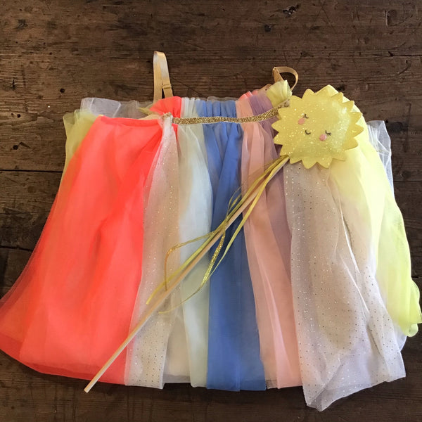 dress folded with wand on top