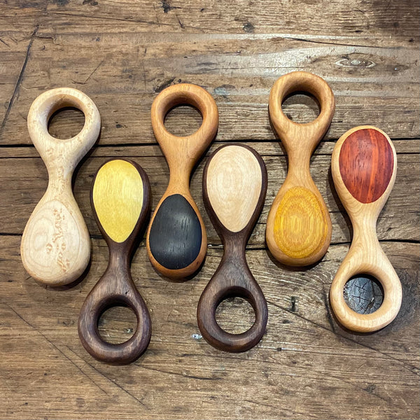 wooden rattles with an open handle
