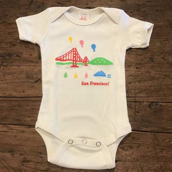 onesie with San Francisco's golden Gate Bridge, hot air balloons and sailboats